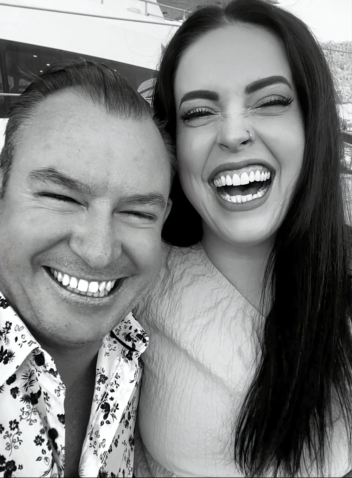 Gemma Post and Deon Wade, Gold Coast business owners and founders of OSCC The Old School Cleaning Co., a Gold Coast cleaning company, laughing together in Currumbin Valley