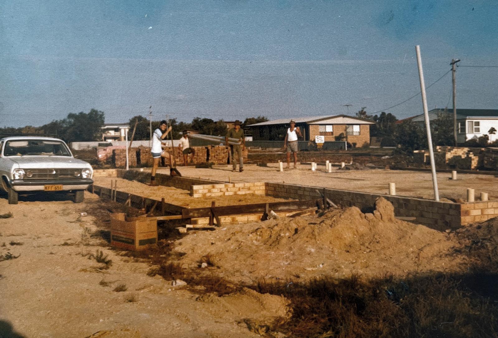 Vintage photo of a house build site. The Old School Cleaning Co.